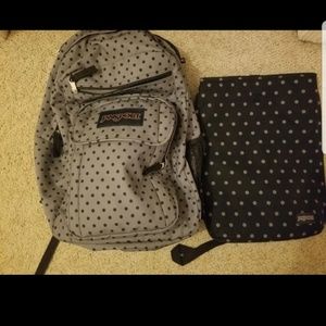 black/grey polka dot backpack